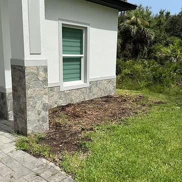 Shoreline erosion control rip rap rock installation by Cezars LLC Southwest Florida